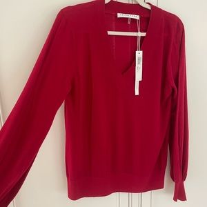 Trina Turk red velvet-neck sweater. Size large. Brand new!